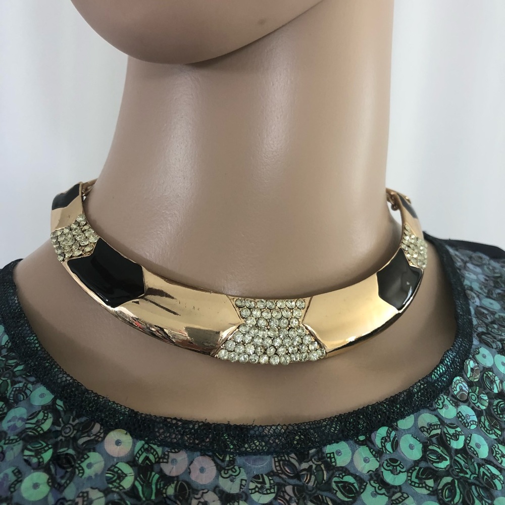 Metal choker gently used. Not sure of brand